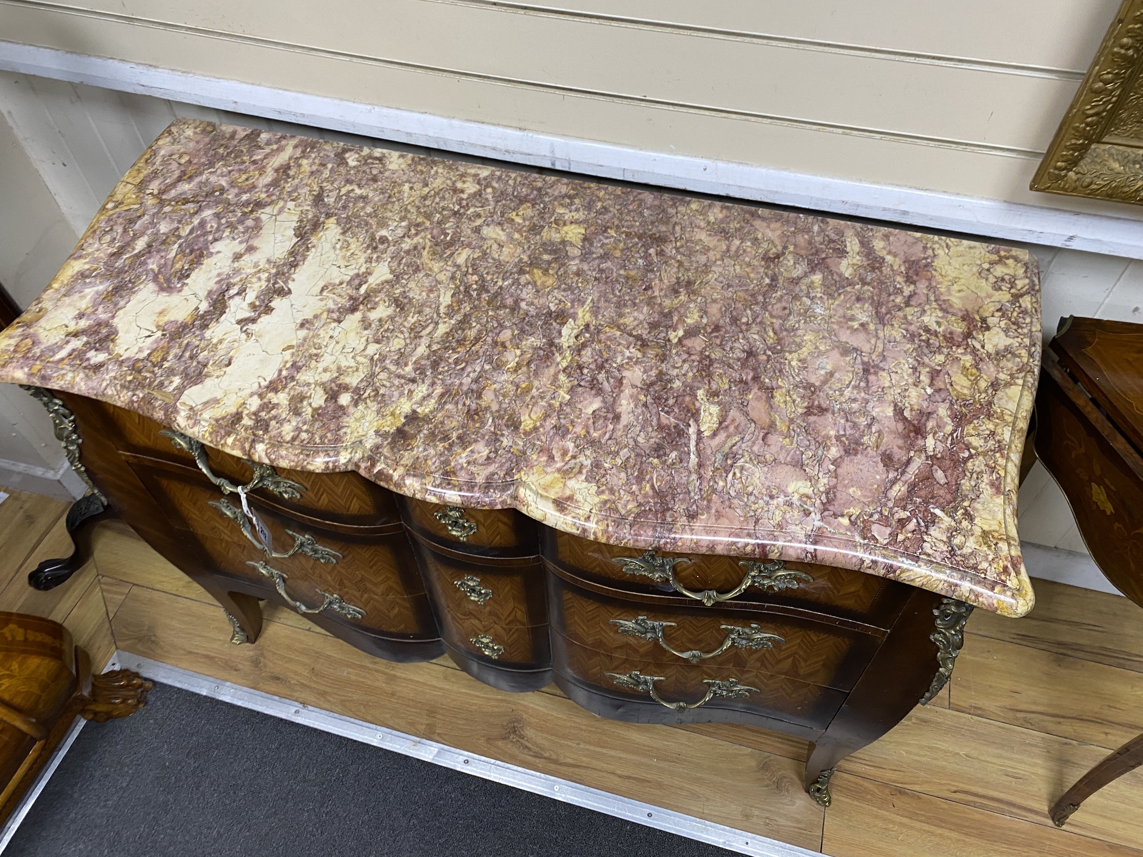 A Louis XVI style kingwood marble topped commode, width 118cm, depth 52cm, height 86cm